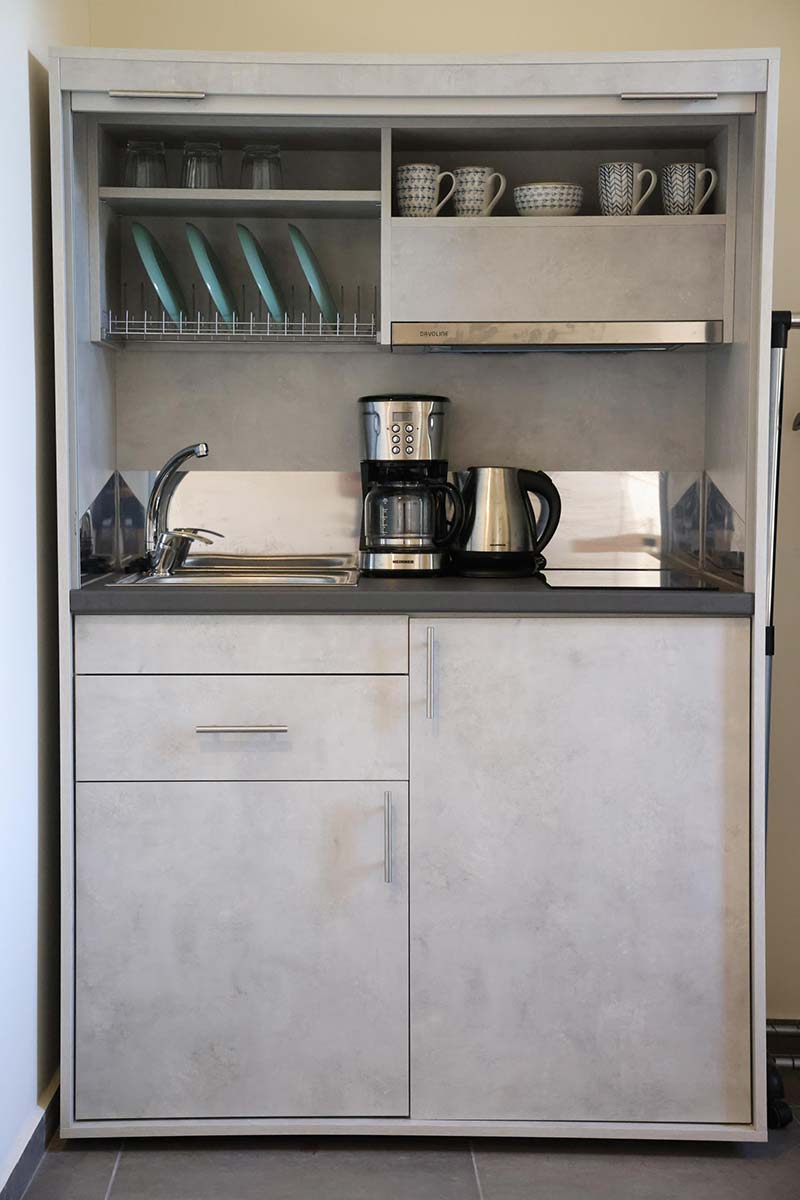 Equipped kitchenette at Xenion 1850 in Chios